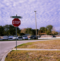 Photograph of the Sunnyland Hospital in Florida parking lot, from a photo series